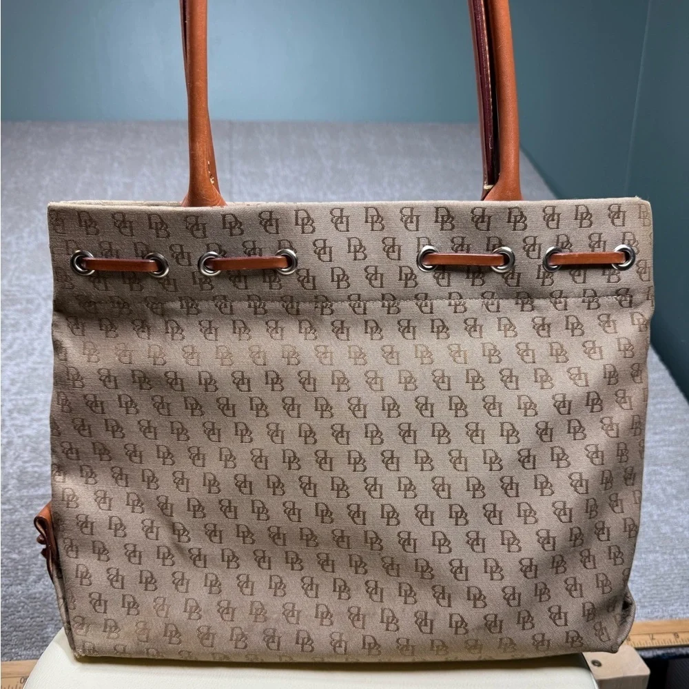 Dooney and Bourke Signature Canvas Tassel Tote